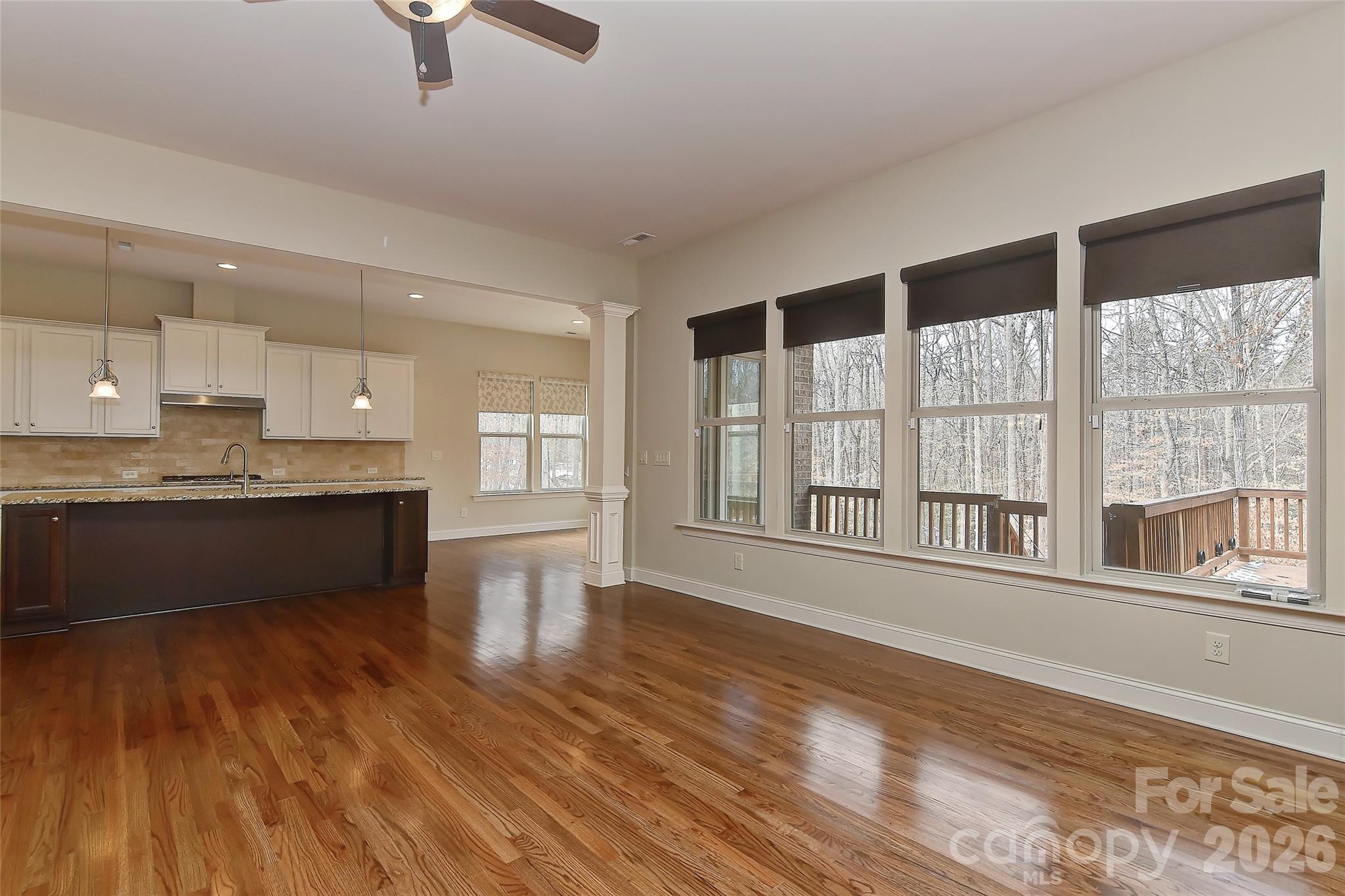 2287 Sweet Clover Way Denver, NC 28037 - Photo 13 of 44 a large kitchen with stainless steel appliances wooden floor and a large window