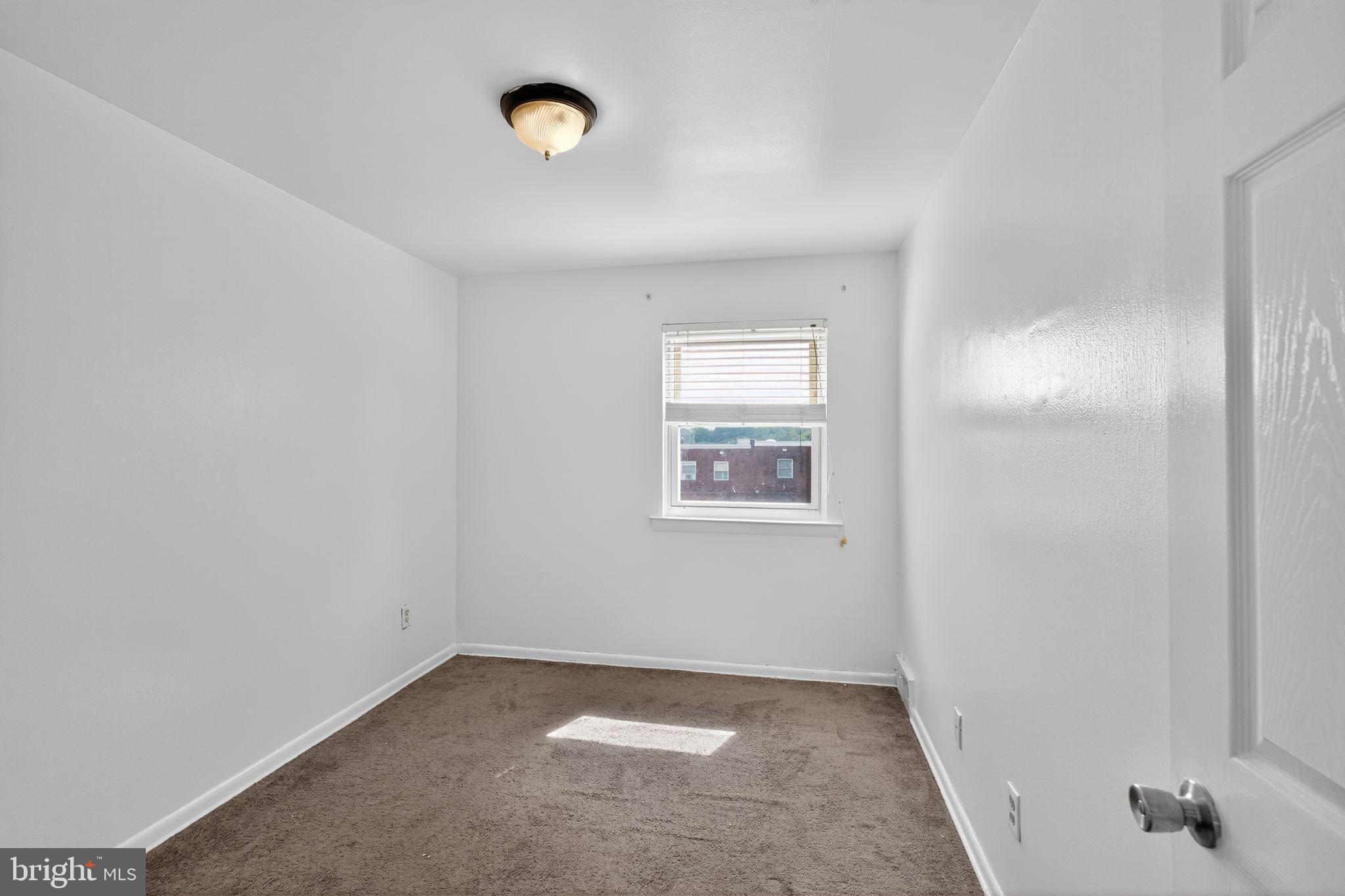 12791 Dunks Ferry Road Philadelphia, PA 19154 - Photo 13 of 26 an empty room with windows