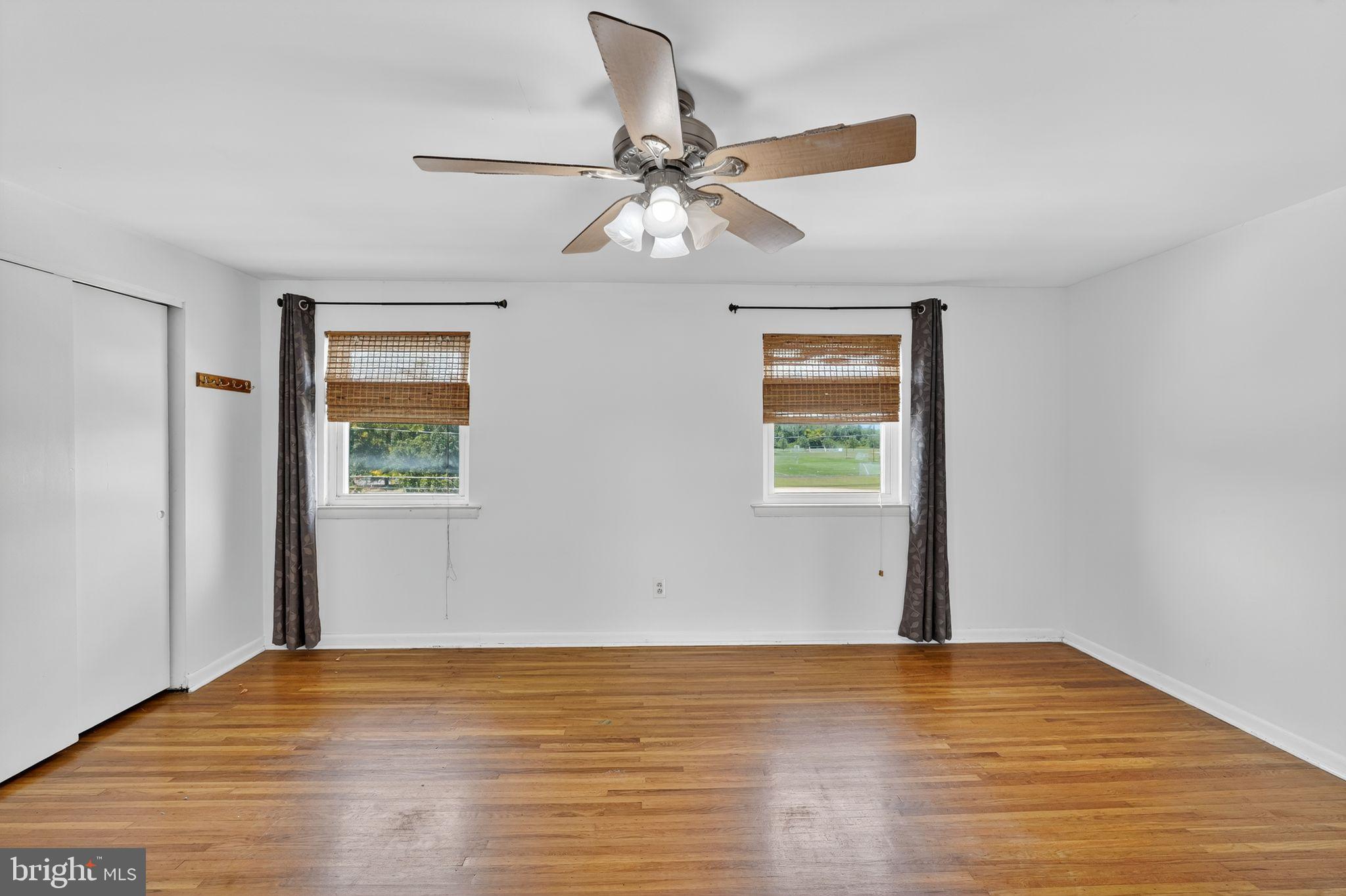 12791 Dunks Ferry Road Philadelphia, PA 19154 - Photo 15 of 26 a view of an empty room with wooden floor and a window