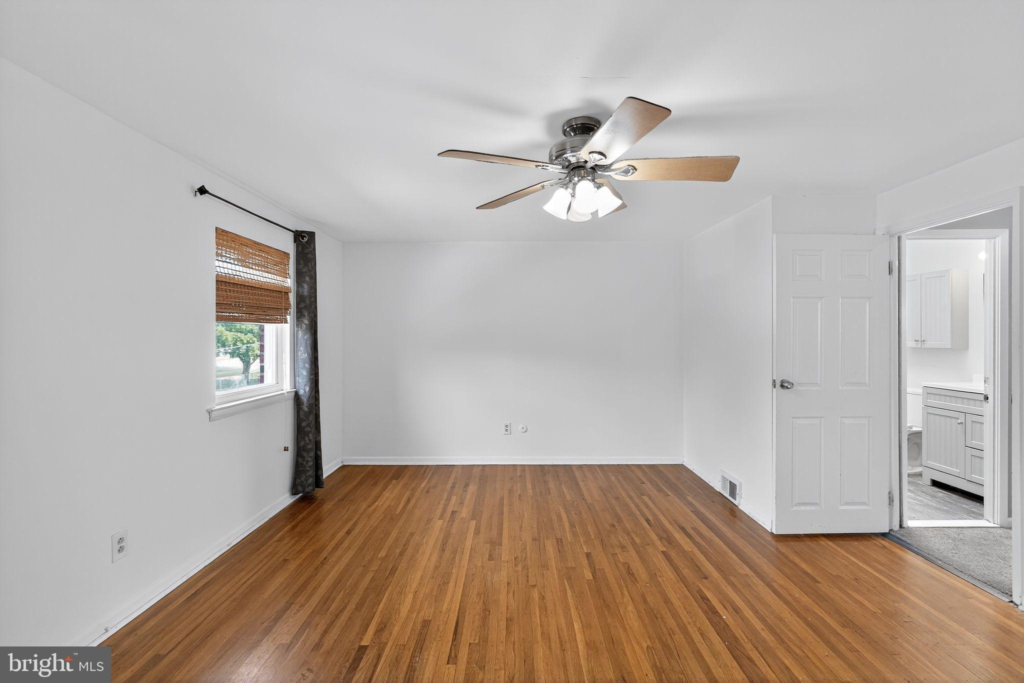 12791 Dunks Ferry Road Philadelphia, PA 19154 - Photo 16 of 26 a view of empty room with wooden floor and fan
