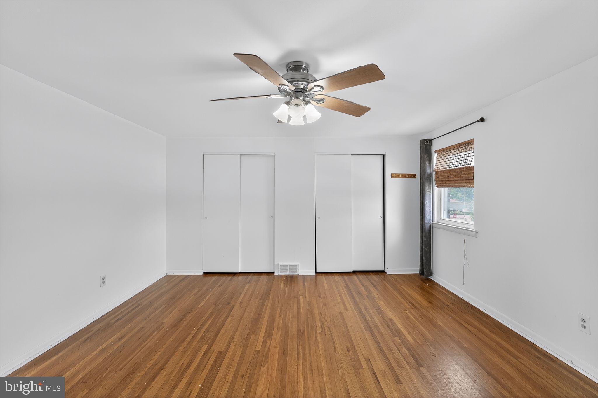 12791 Dunks Ferry Road Philadelphia, PA 19154 - Photo 17 of 26 a view of a room with wooden floor and a ceiling fan