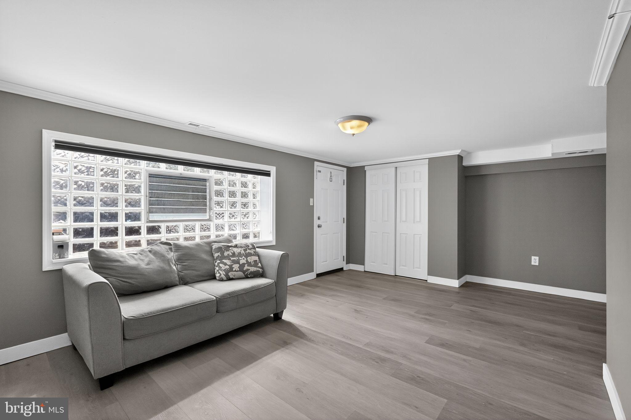 12791 Dunks Ferry Road Philadelphia, PA 19154 - Photo 21 of 26 a living room with furniture and a large window