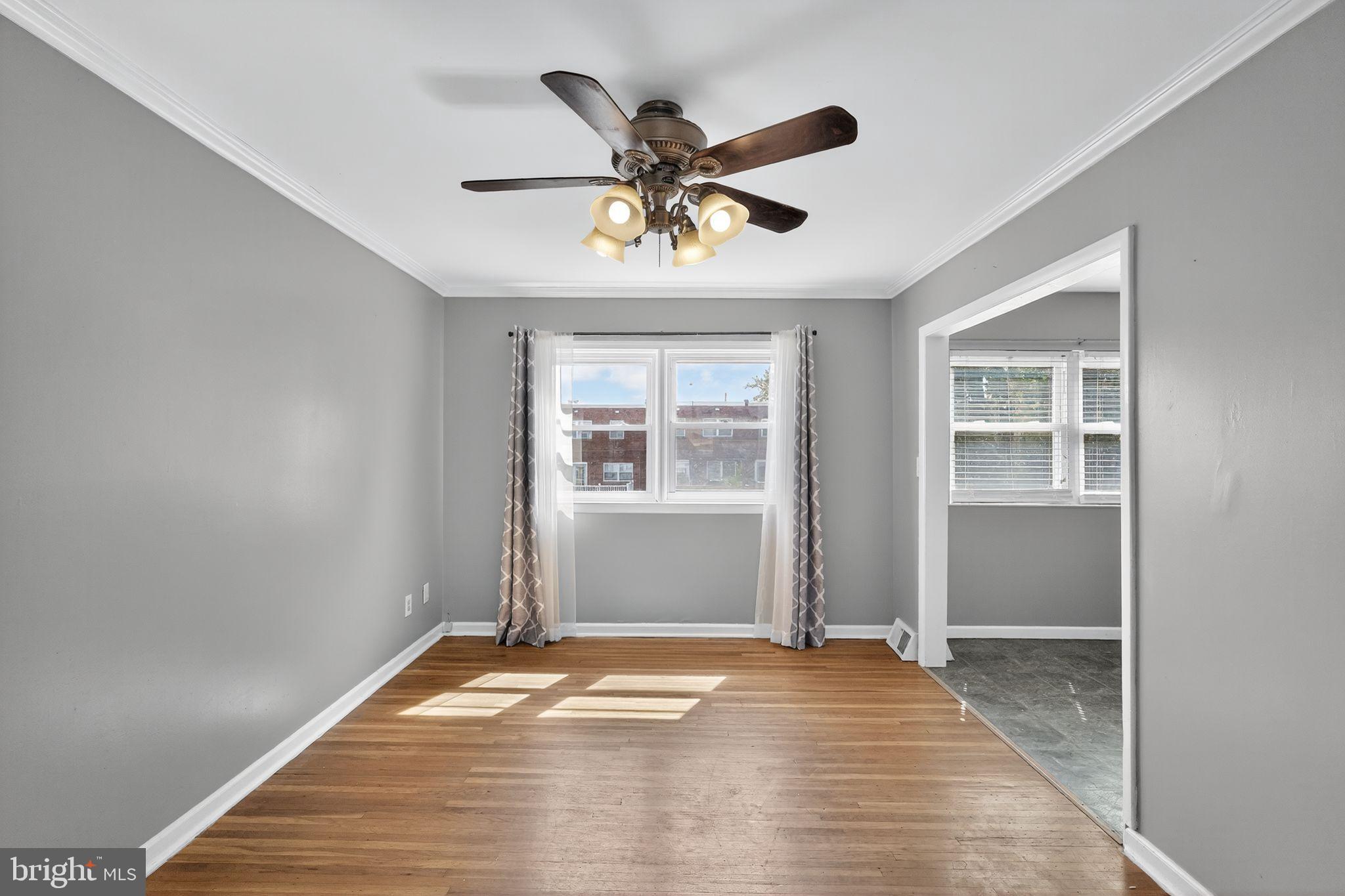12791 Dunks Ferry Road Philadelphia, PA 19154 - Photo 4 of 26 a view of a livingroom with a ceiling fan and window