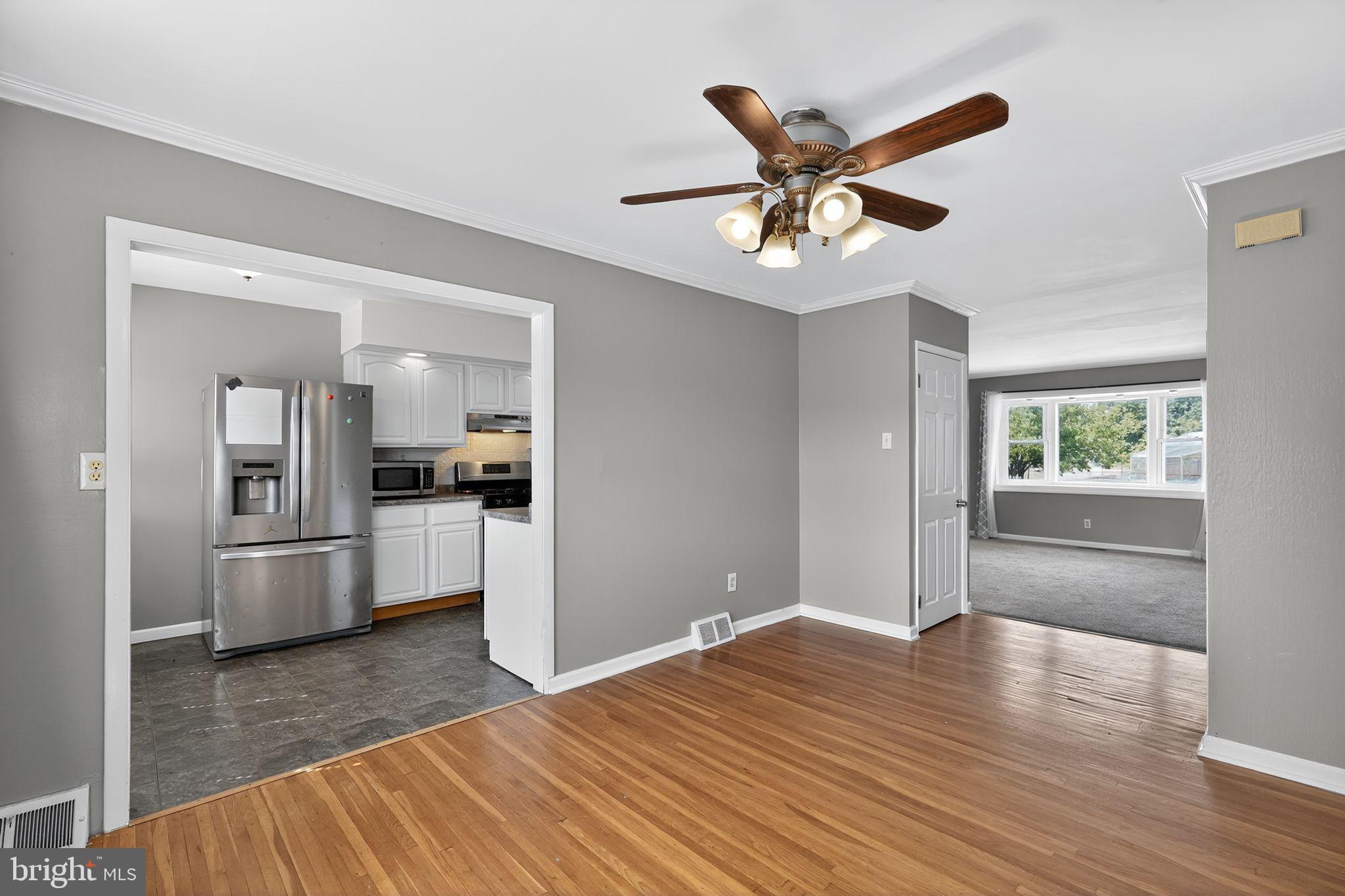 12791 Dunks Ferry Road Philadelphia, PA 19154 - Photo 6 of 26 a workspace with wooden floor and ceiling fan
