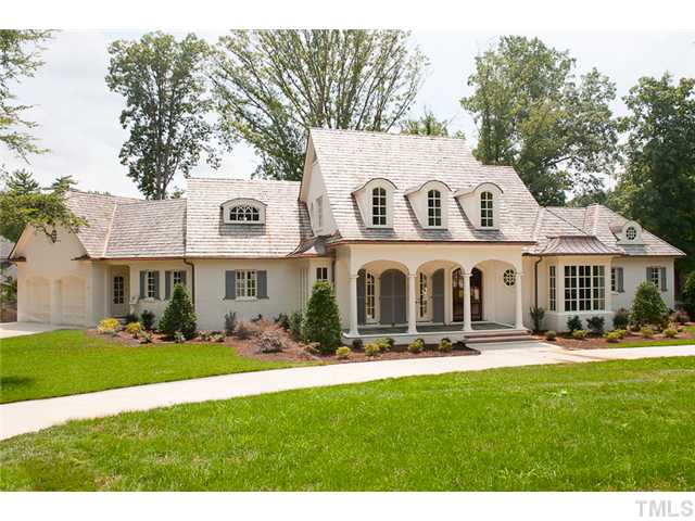 2506 Anderson Drive Raleigh, NC 27608 - Photo 1 of 12 a front view of a house with a yard