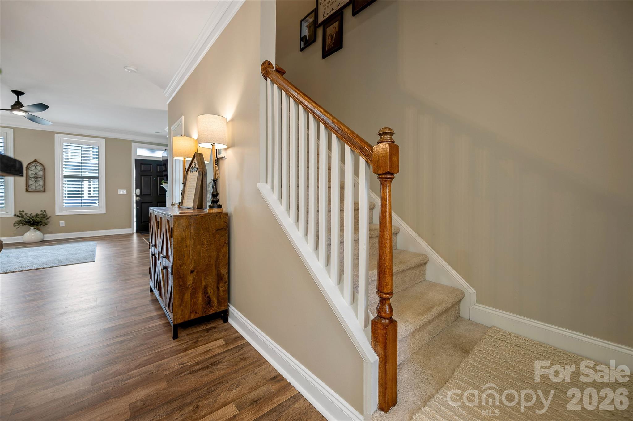 1213 Assembly Street Belmont, NC 28012 - Photo 13 of 32 a view of a hallway with wooden floor and staircase