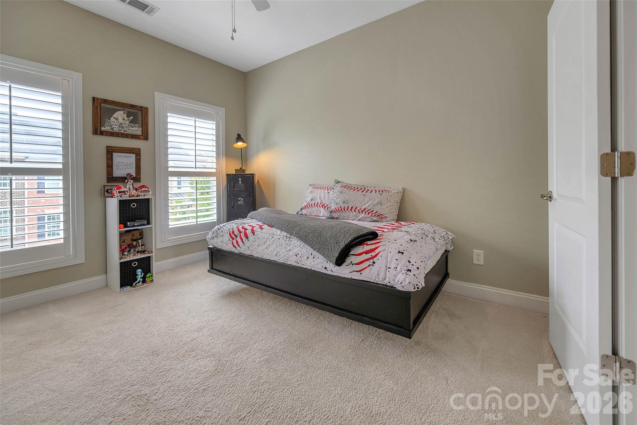 1213 Assembly Street Belmont, NC 28012 - Photo 18 of 32 a bedroom with a bed and a window