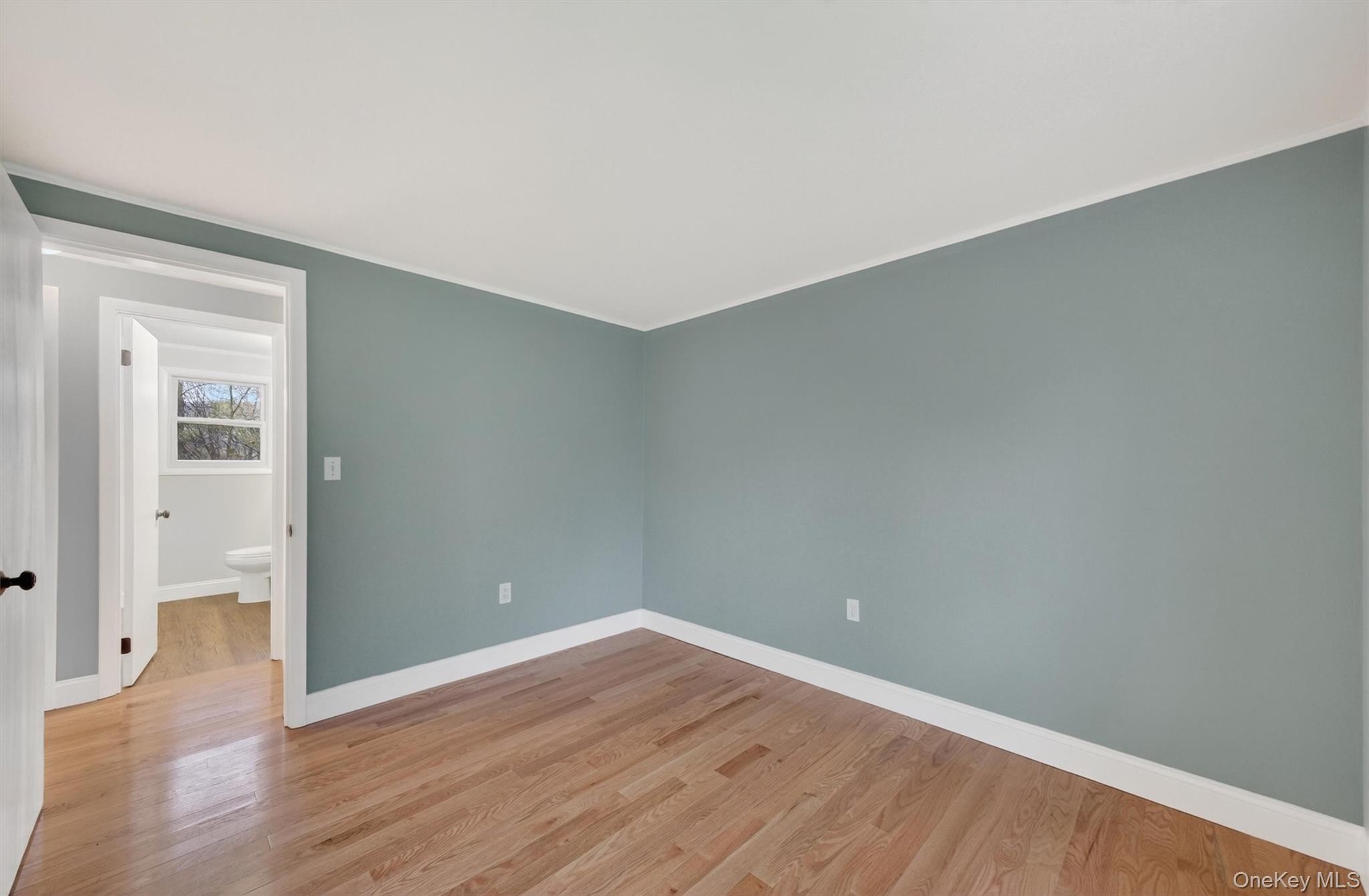 69 Hy Vue Terrace Cold Spring, NY 10516 - Photo 17 of 44 a view of an empty room with wooden floor