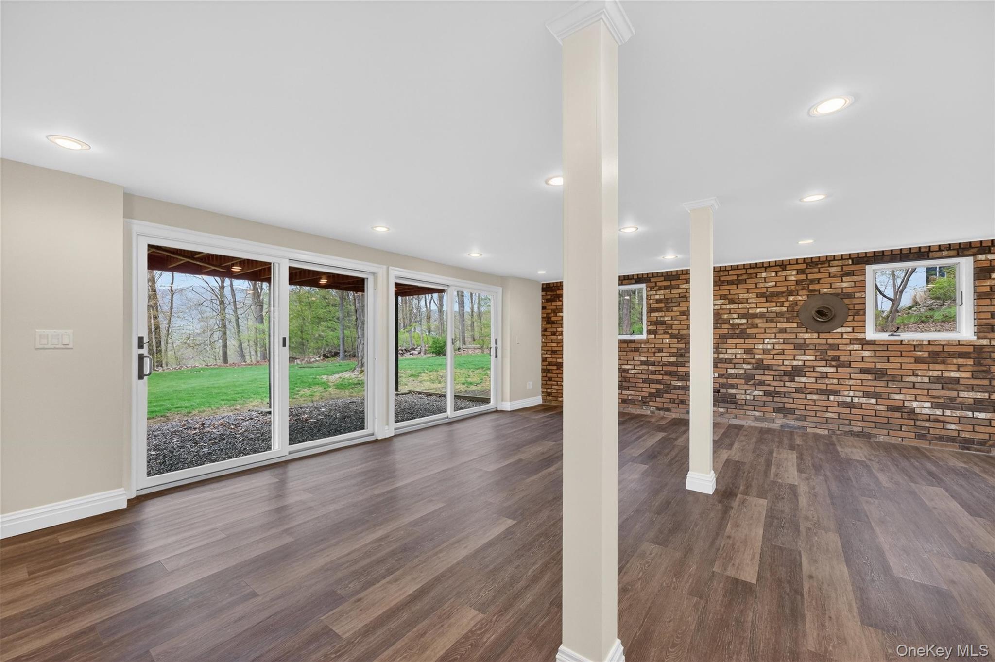 69 Hy Vue Terrace Cold Spring, NY 10516 - Photo 25 of 44 a view of an empty room with wooden floor and a window