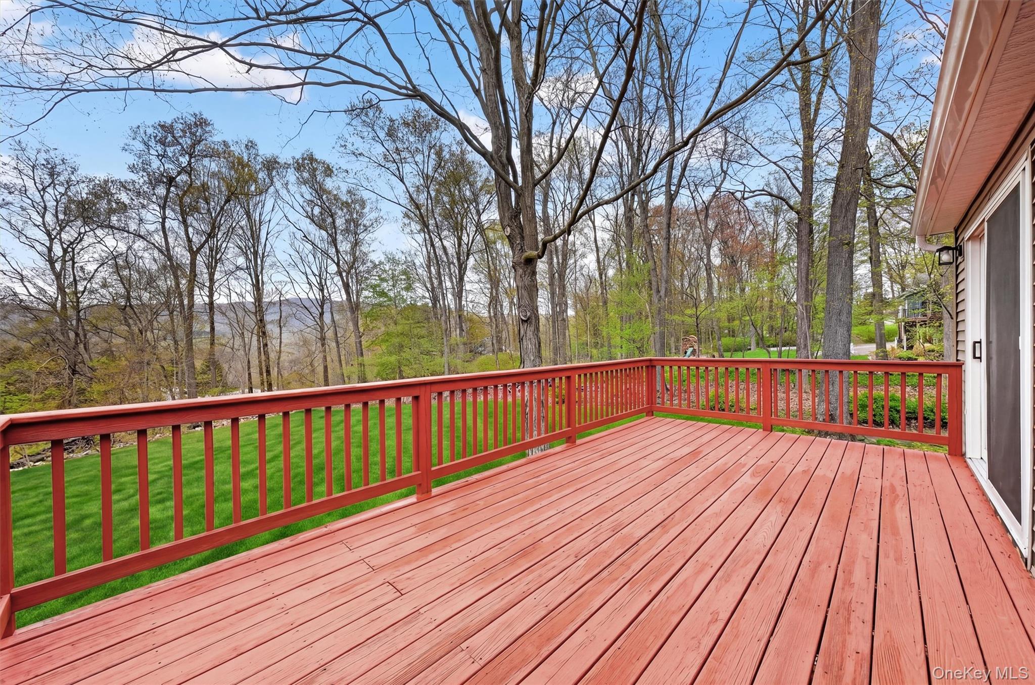 69 Hy Vue Terrace Cold Spring, NY 10516 - Photo 31 of 44 a view of deck with wooden floor and trees