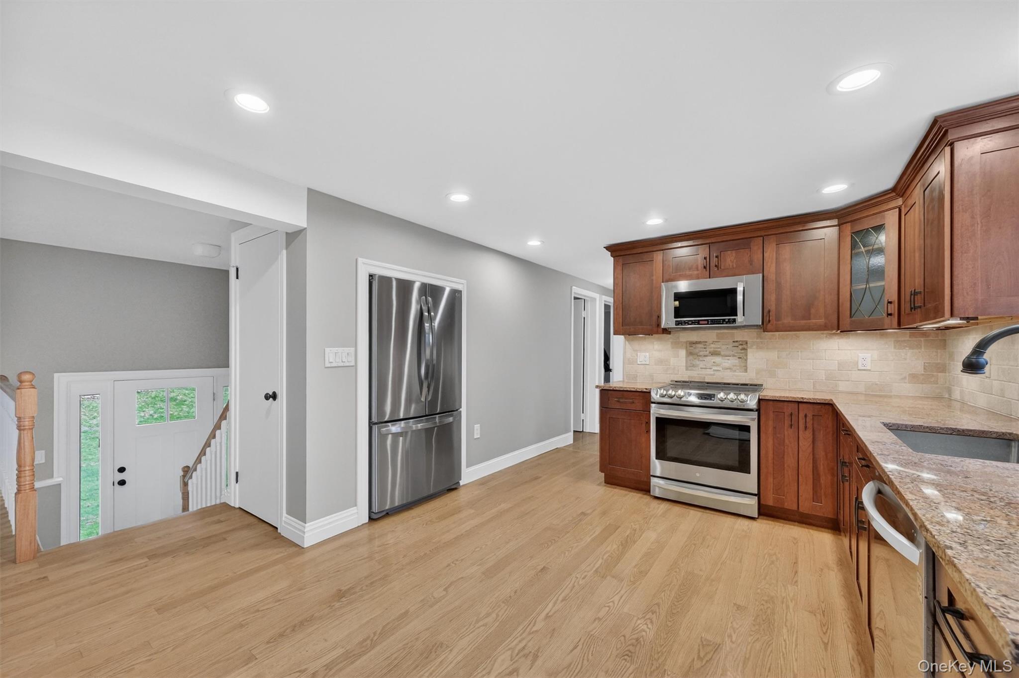 69 Hy Vue Terrace Cold Spring, NY 10516 - Photo 4 of 44 a kitchen with stainless steel appliances granite countertop a refrigerator stove and oven