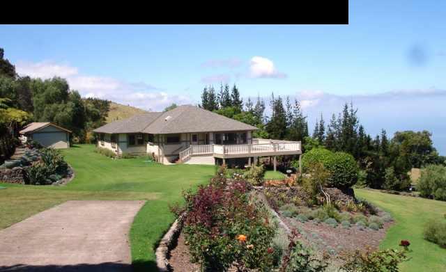 1070 Polipoli Road Kula, HI 96790 - Photo 1 of 20 a view of a house with a yard and sitting area