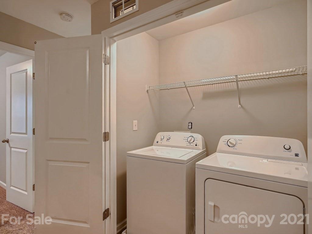 4040 Queensbridge Road Charlotte, NC 28213 - Photo 24 of 28 a utility room with dryer and washer