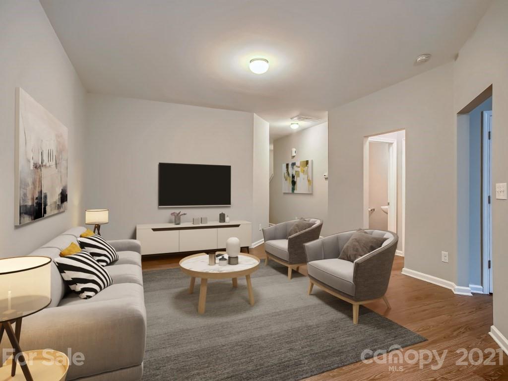 4040 Queensbridge Road Charlotte, NC 28213 - Photo 6 of 28 a living room with furniture and a flat screen tv