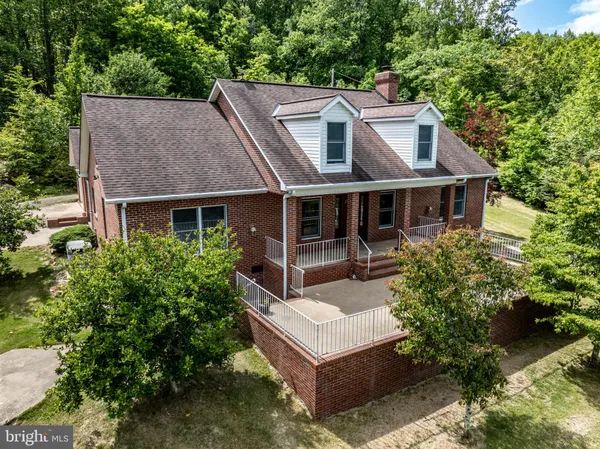 front view of a house with a garden