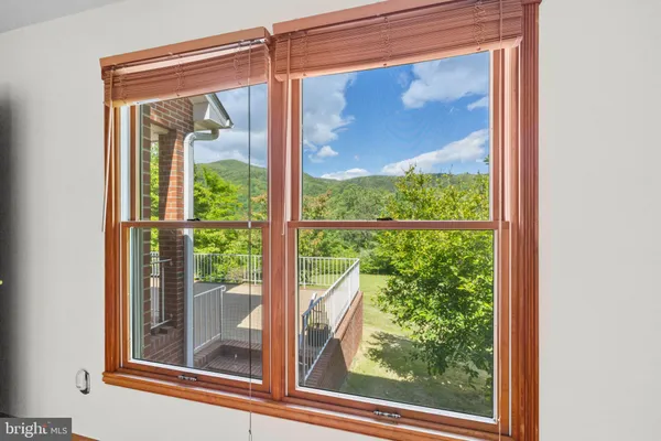 a bathroom with a bath tub and shower