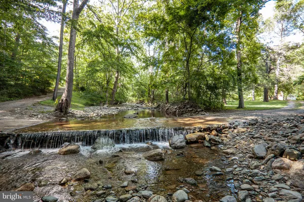 a view of an outdoor space with a lake view