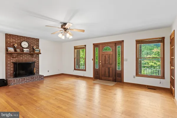 a bathroom with a tub sink and a window