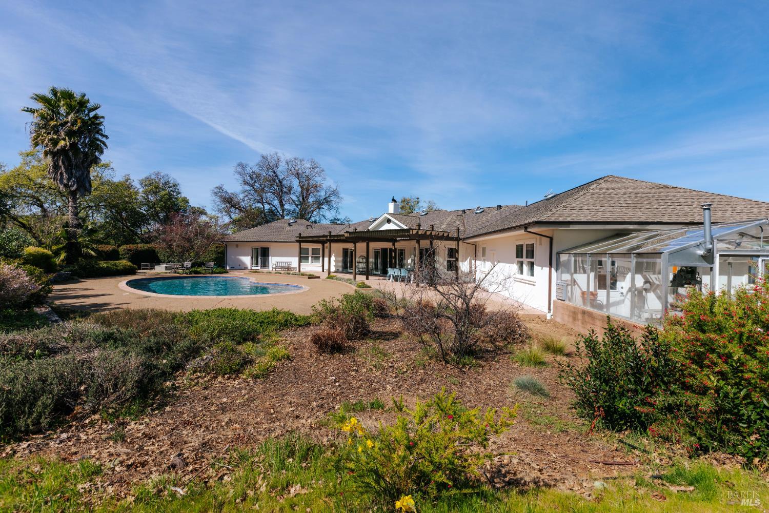 12801 Valley View Drive Ukiah, CA 95482 - Photo 16 of 22 a front view of house with yard and trees around