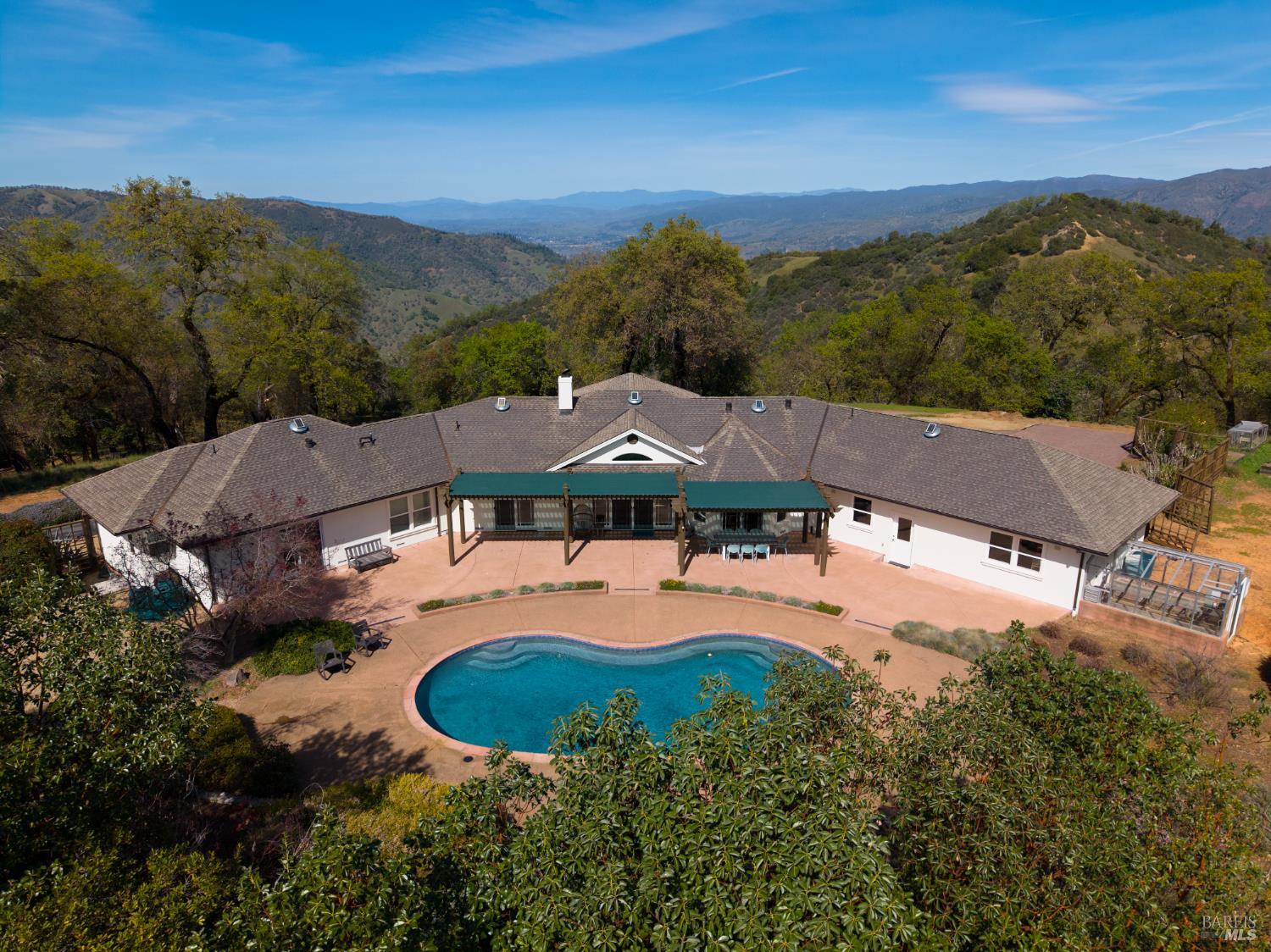 12801 Valley View Drive Ukiah, CA 95482 - Photo 18 of 22 an aerial view of a house with mountain view