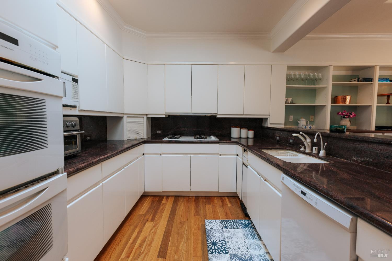 12801 Valley View Drive Ukiah, CA 95482 - Photo 22 of 22 a kitchen with granite countertop stainless steel appliances and white cabinets