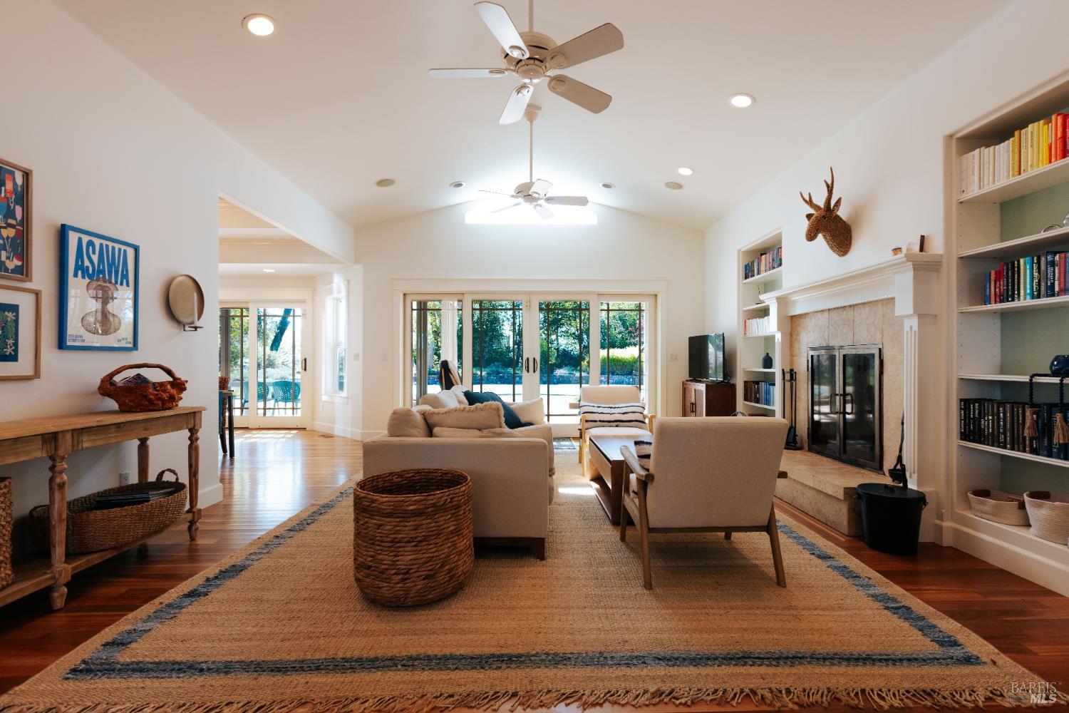 12801 Valley View Drive Ukiah, CA 95482 - Photo 3 of 22 a living room with furniture a rug and a chandelier