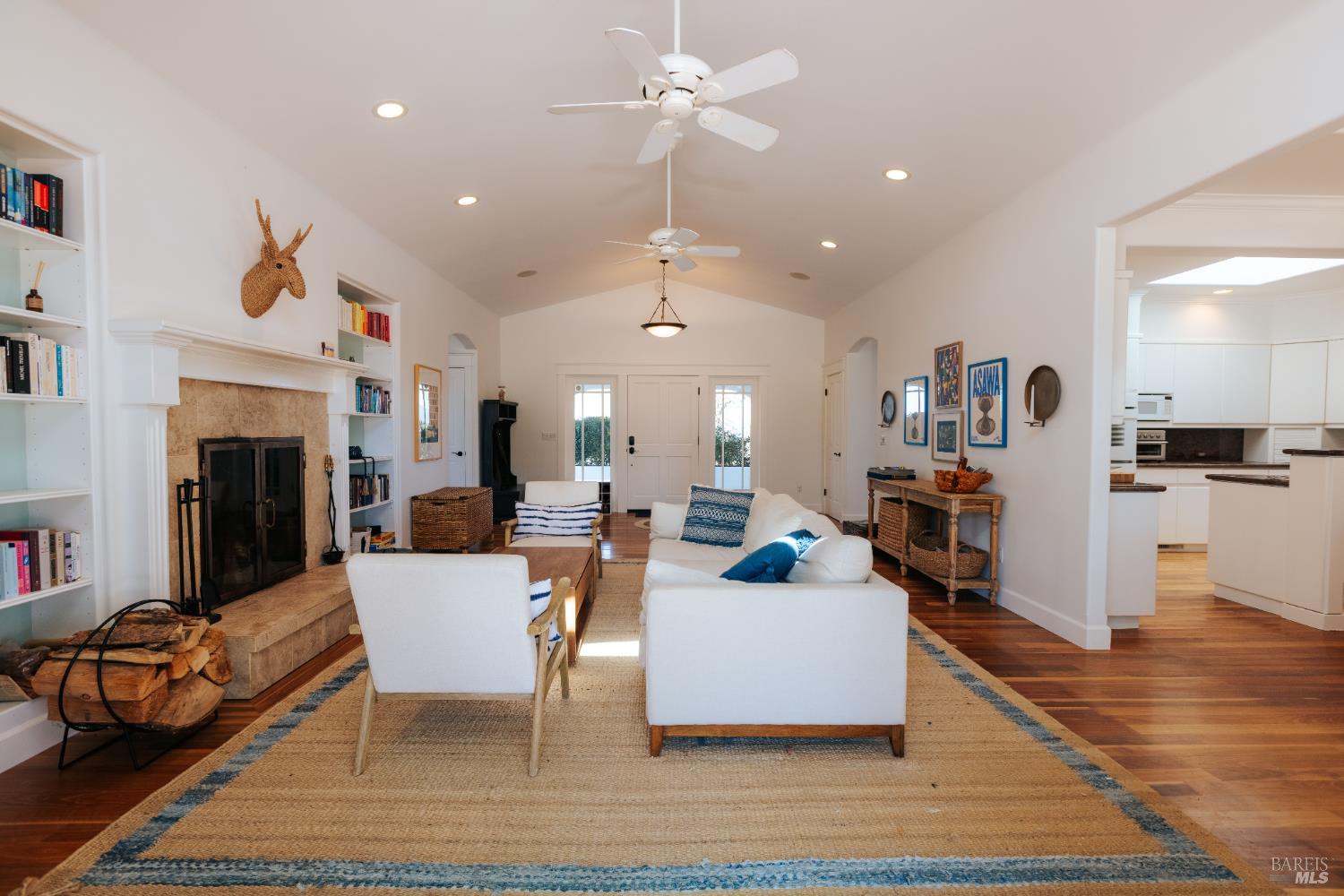 12801 Valley View Drive Ukiah, CA 95482 - Photo 4 of 22 a living room with fireplace furniture and a wooden floor