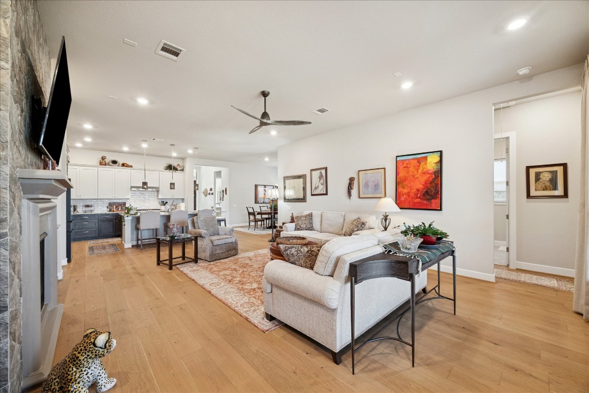 28722 Rising Moon Lane Fulshear, TX 77441 - Photo 13 of 30 a living room with furniture and a flat screen tv