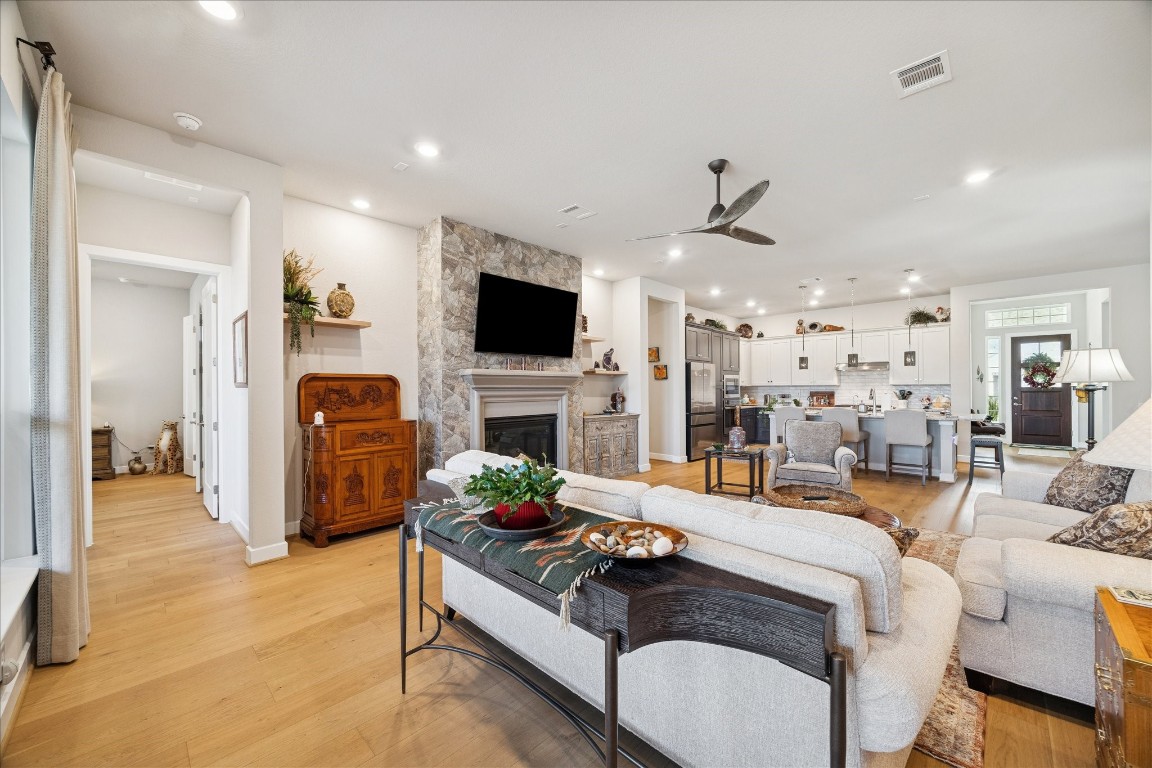 28722 Rising Moon Lane Fulshear, TX 77441 - Photo 17 of 30 a living room with furniture and a flat screen tv