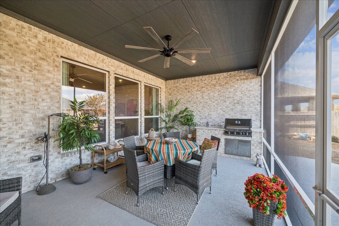28722 Rising Moon Lane Fulshear, TX 77441 - Photo 25 of 30 a living room with furniture and a large window