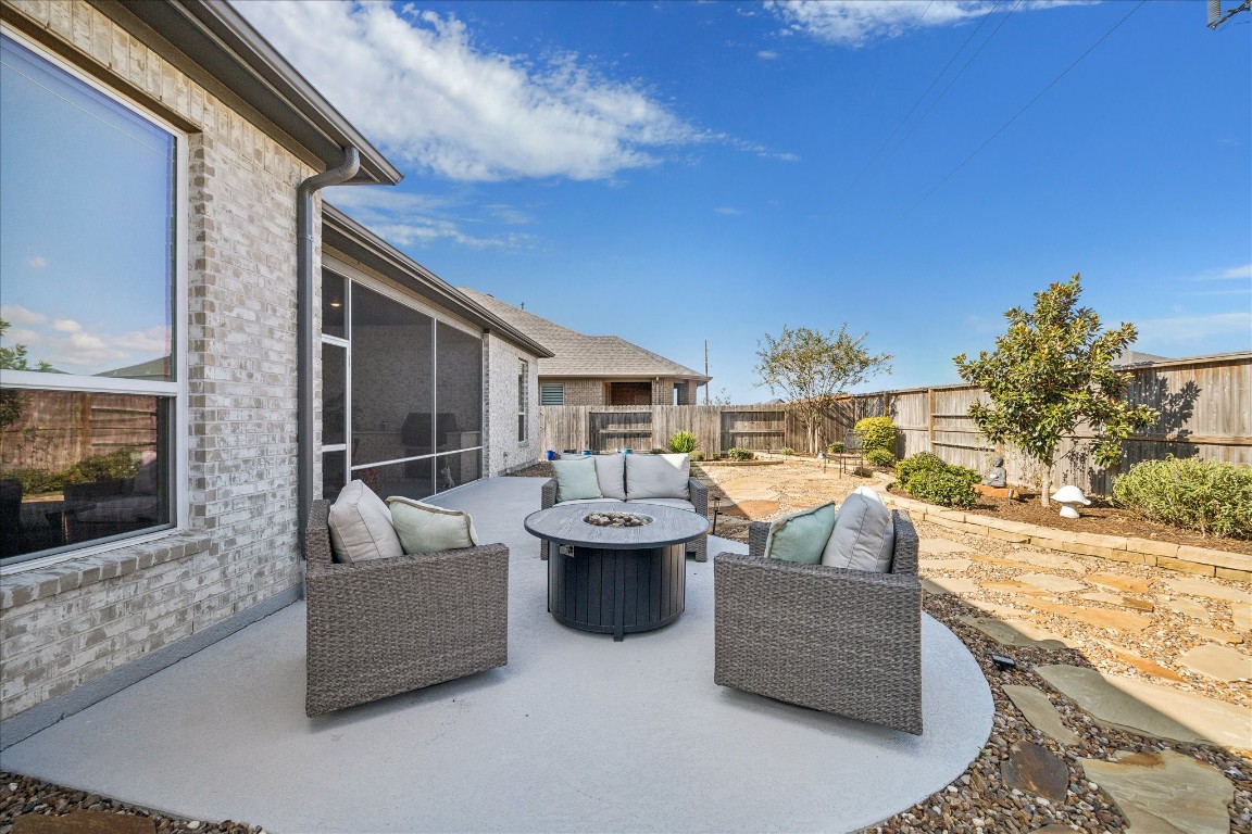 28722 Rising Moon Lane Fulshear, TX 77441 - Photo 27 of 30 a view of a patio with couches and potted plants