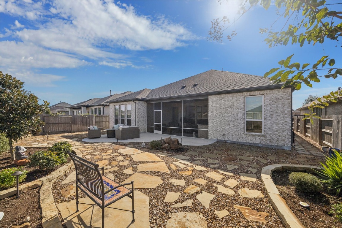 28722 Rising Moon Lane Fulshear, TX 77441 - Photo 28 of 30 a view of a house with backyard sitting area and tub