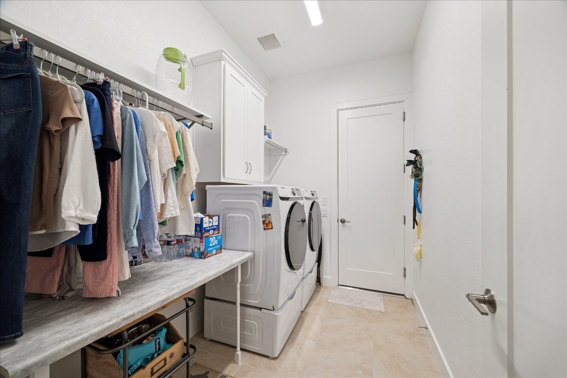 28722 Rising Moon Lane Fulshear, TX 77441 - Photo 9 of 30 a view of walk in closet with clothes and shoes
