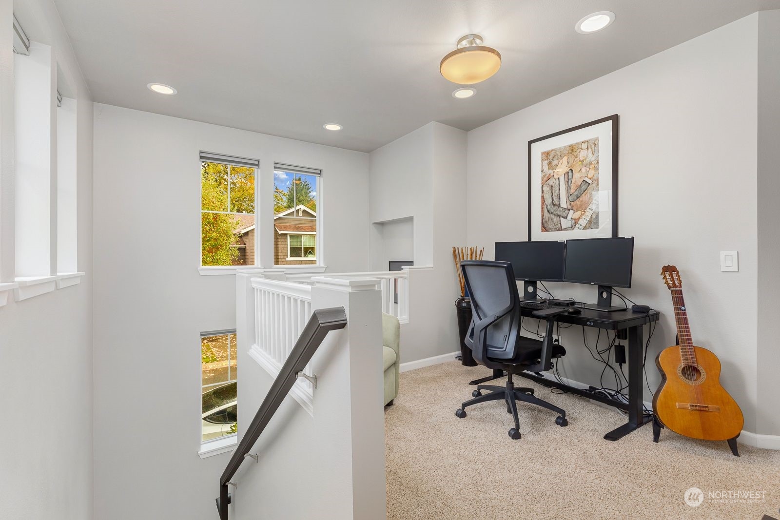 4514 Northeast 5th Street Renton, WA 98059 - Photo 18 of 36 a view of a workspace with furniture and a window