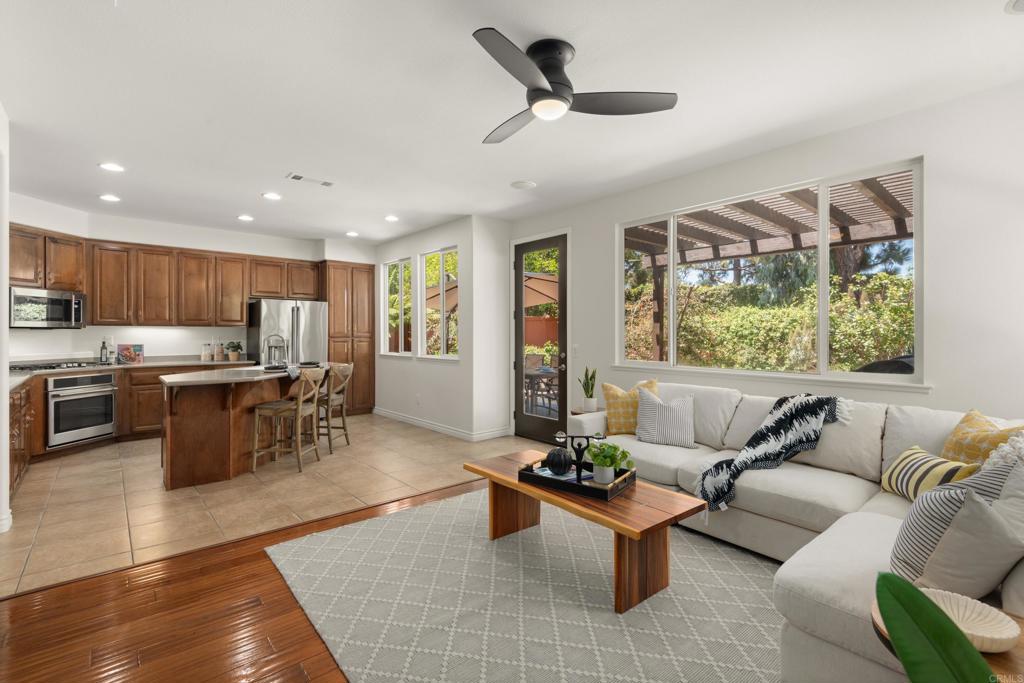 5439 Foxtail Loop Carlsbad, CA 92010 - Photo 12 of 47 a living room with furniture and a large window