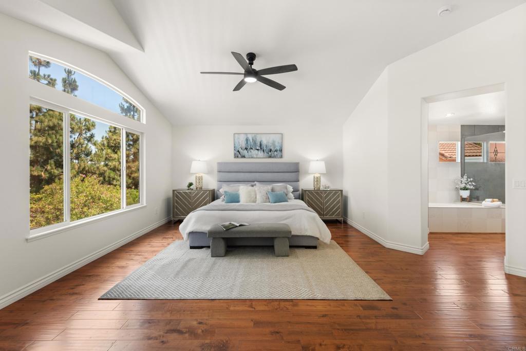 5439 Foxtail Loop Carlsbad, CA 92010 - Photo 19 of 47 a bedroom with a bed and window