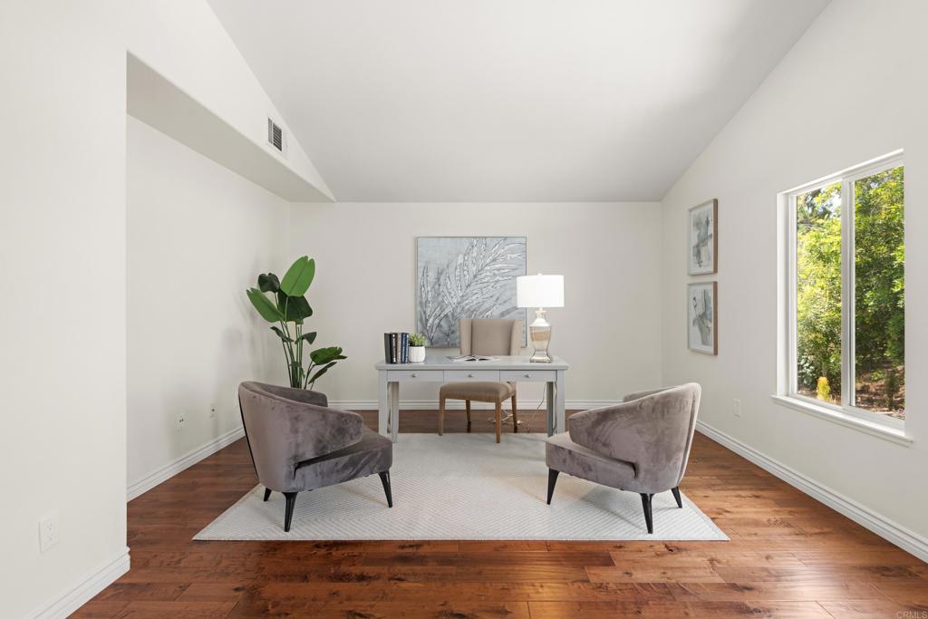 5439 Foxtail Loop Carlsbad, CA 92010 - Photo 21 of 47 a living room with furniture and a window