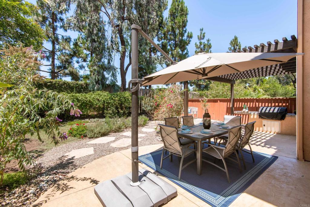 5439 Foxtail Loop Carlsbad, CA 92010 - Photo 39 of 47 a view of a patio with furniture and backyard