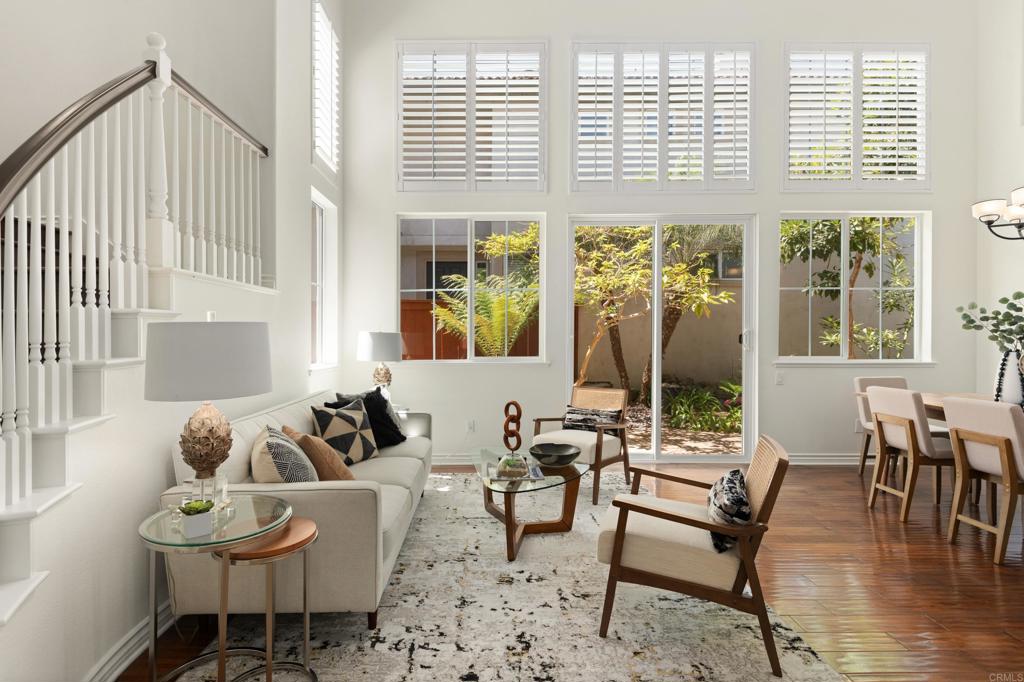 5439 Foxtail Loop Carlsbad, CA 92010 - Photo 4 of 47 a living room with furniture and a large window