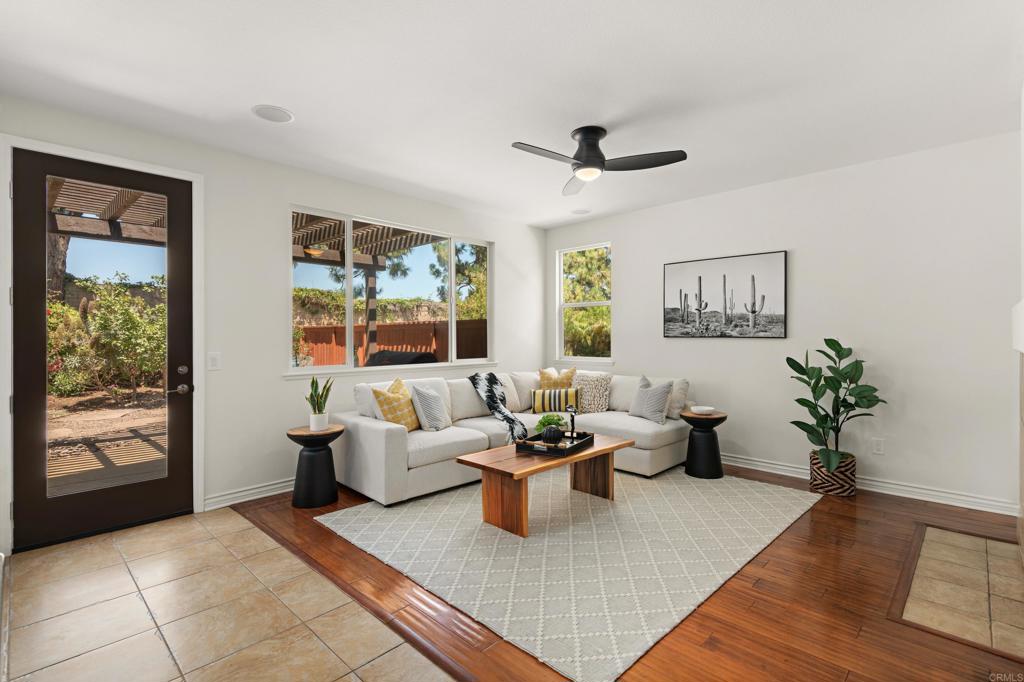 5439 Foxtail Loop Carlsbad, CA 92010 - Photo 10 of 47 a living room with furniture and a large window
