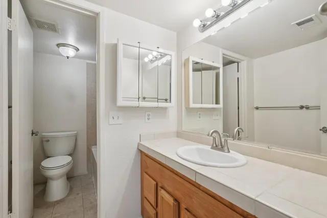 a bathroom with a bath tub and a shower