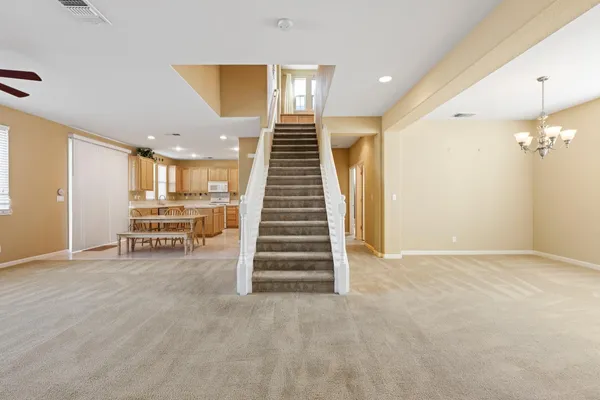 a view of livingroom with stairs and ventilation