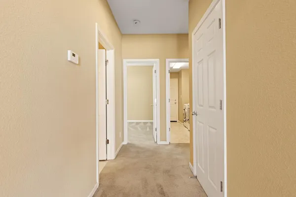a view of a bathroom with a glass door