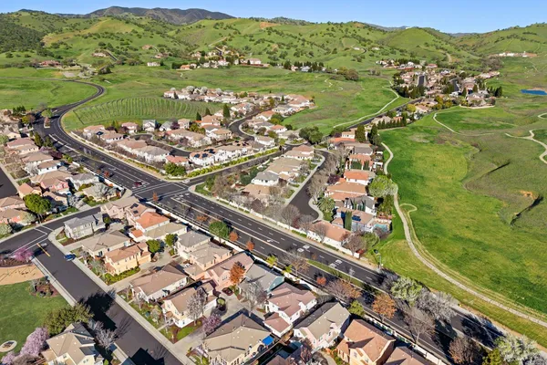 a view of a city with a lake