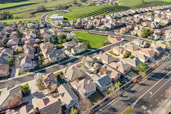 a view of a swimming pool with a yard