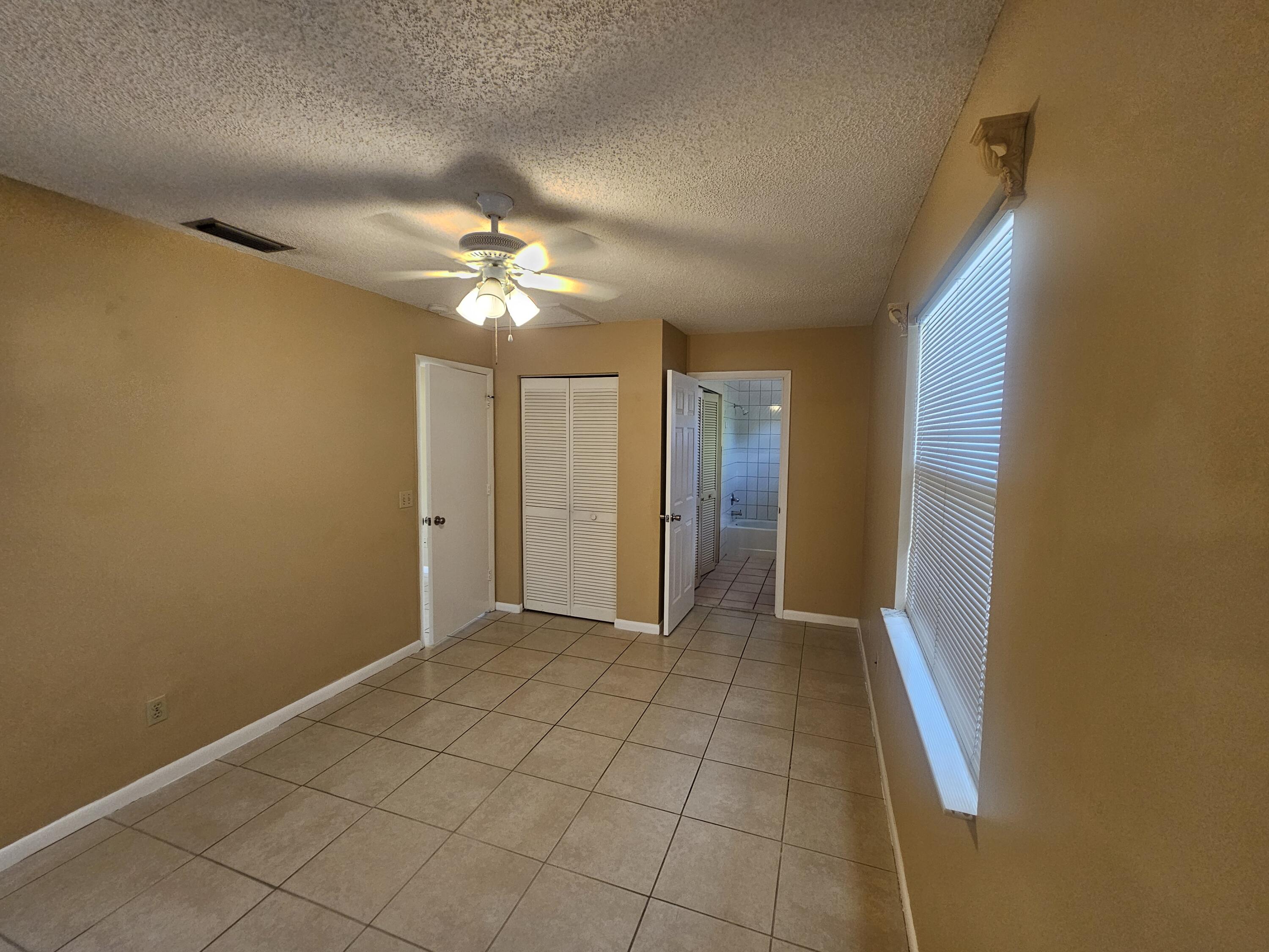 903 Northwest Spruce Ridge Drive, Unit 4 Stuart, FL 34994 - Photo 2 of 27 20260428_135156