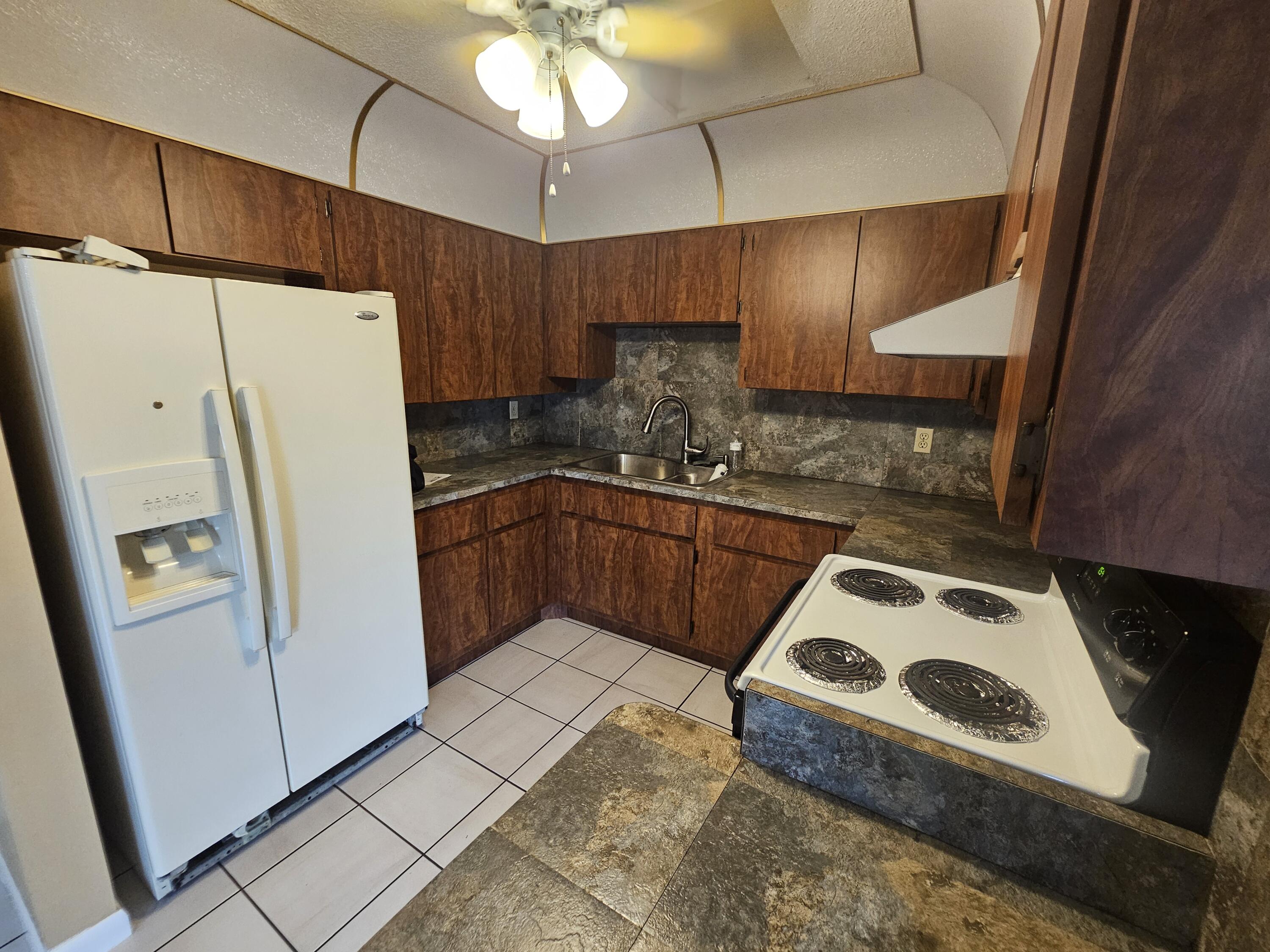 903 Northwest Spruce Ridge Drive, Unit 4 Stuart, FL 34994 - Photo 3 of 27 20260428_135405