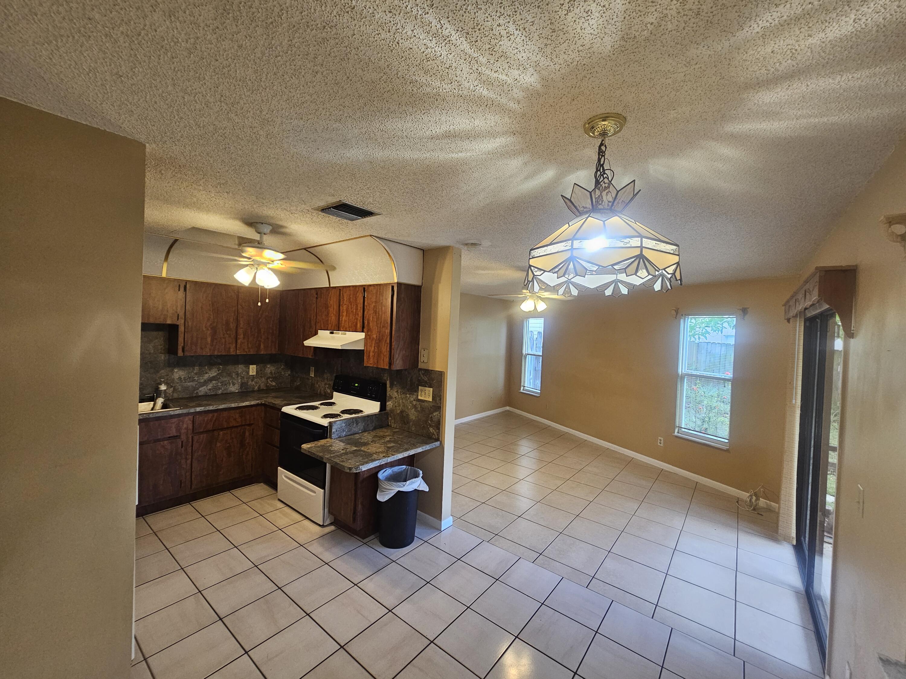 903 Northwest Spruce Ridge Drive, Unit 4 Stuart, FL 34994 - Photo 6 of 27 20260428_134202