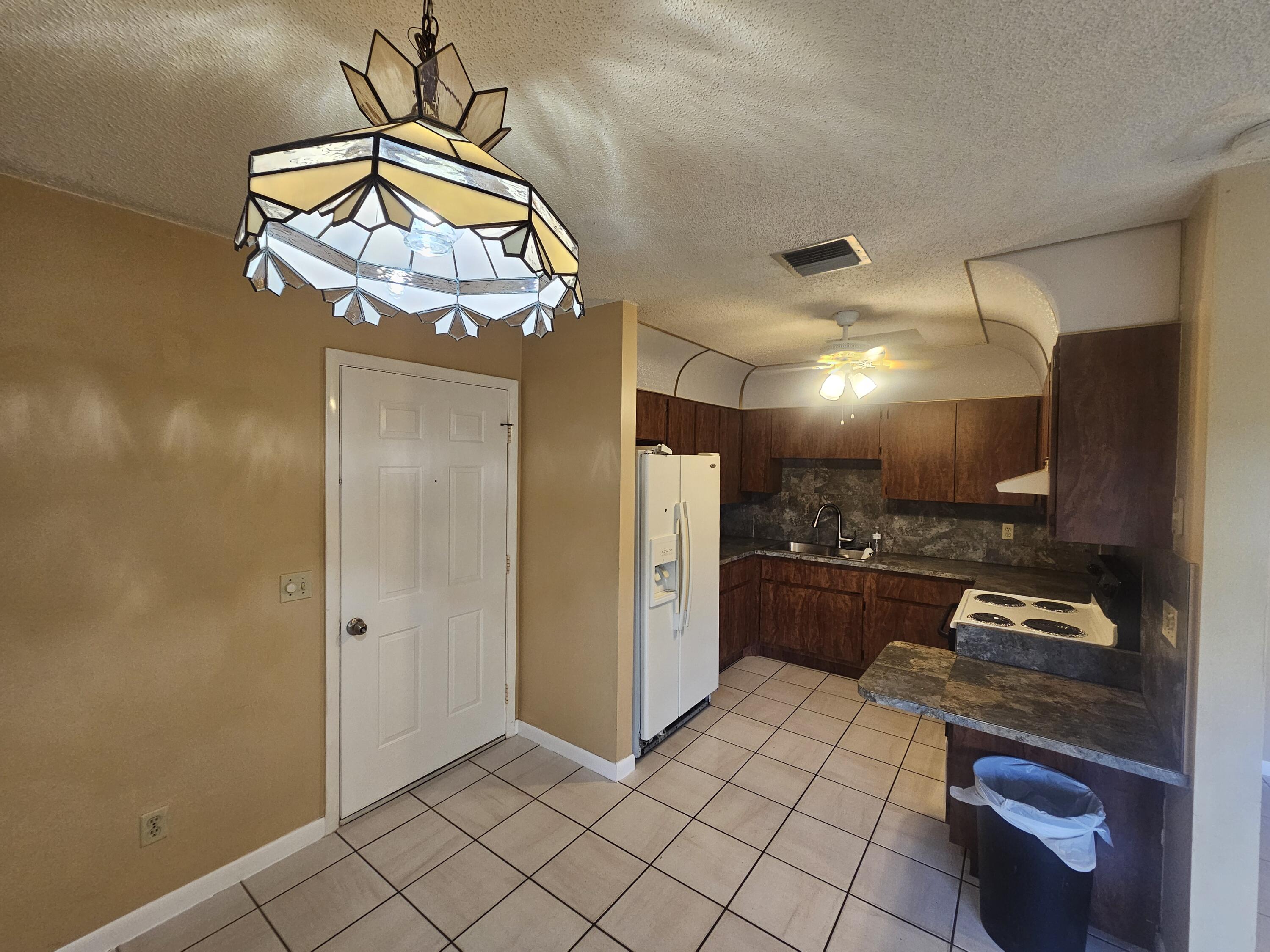 903 Northwest Spruce Ridge Drive, Unit 4 Stuart, FL 34994 - Photo 7 of 27 20260428_134214
