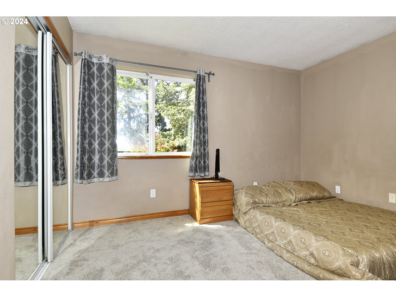 31955 Southeast Compton Road Boring, OR 97009 - Photo 12 of 48 a bedroom with a bed and a window